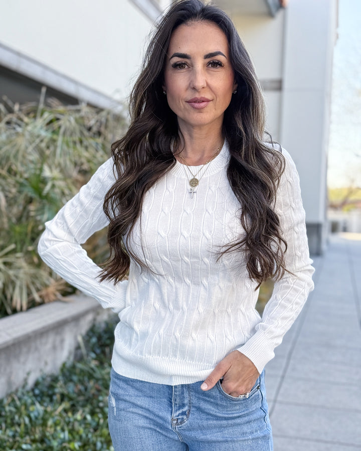 The Round Neck Cable Knit Long Sleeved Sweater