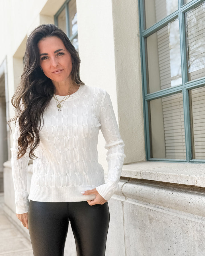 The Round Neck Cable Knit Long Sleeved Sweater