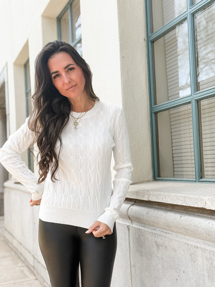 The Round Neck Cable Knit Long Sleeved Sweater
