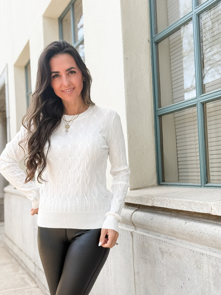 The Round Neck Cable Knit Long Sleeved Sweater
