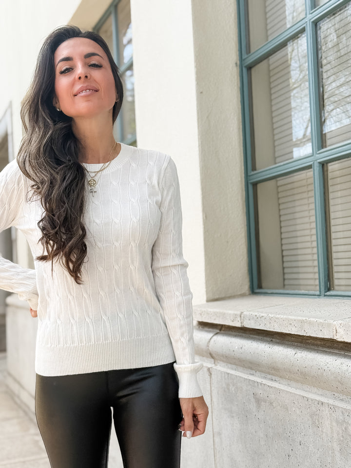The Round Neck Cable Knit Long Sleeved Sweater