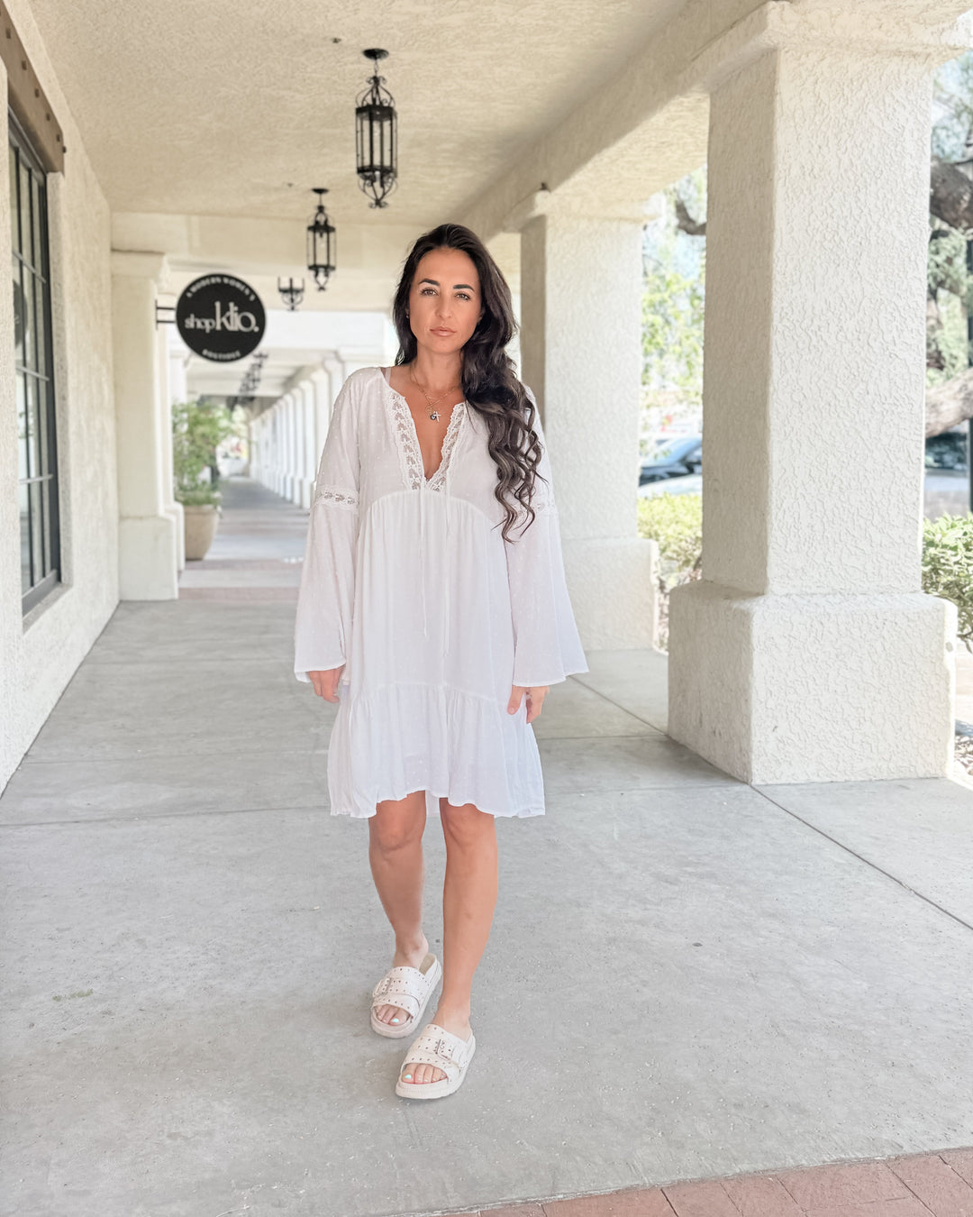 The Lace Trimmed Bell Sleeve Babydoll Dress