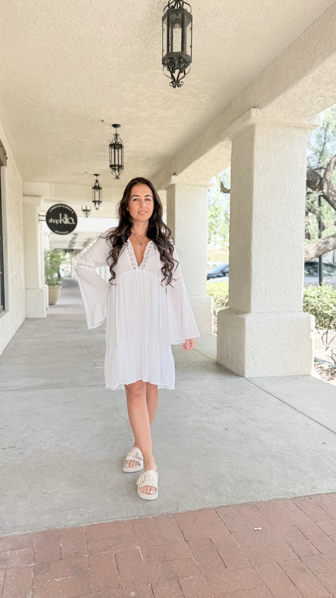 The Lace Trimmed Bell Sleeve Babydoll Dress
