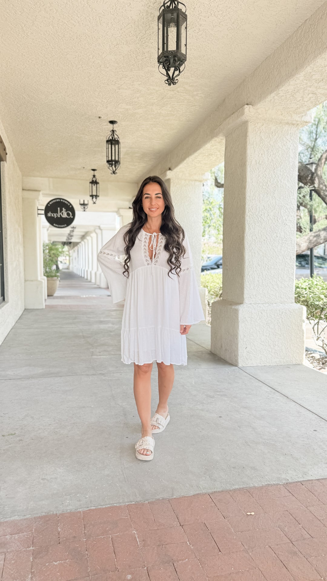 The Lace Trimmed Bell Sleeve Babydoll Dress
