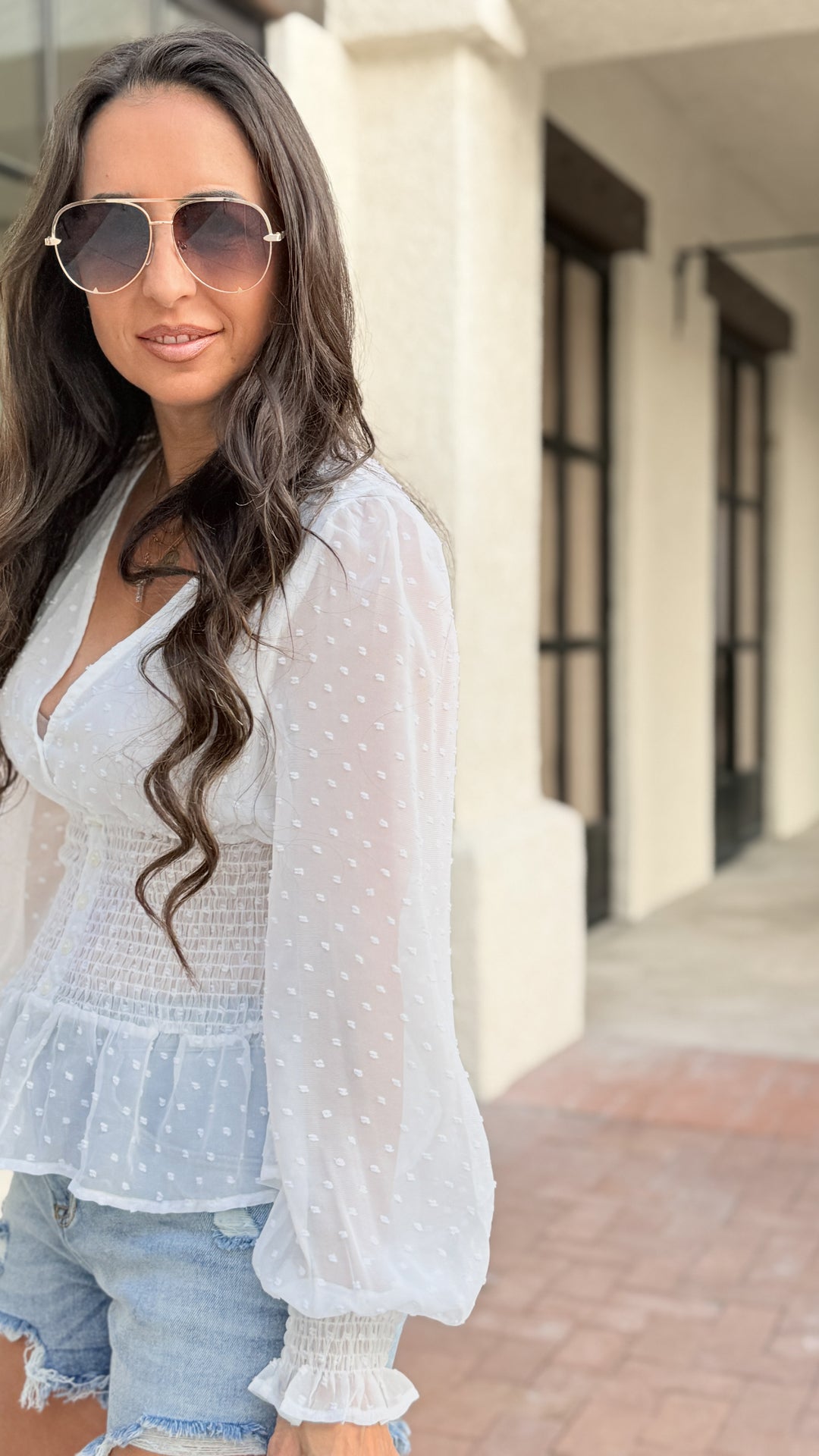 The Toni Swiss Dot Smocked Blouse