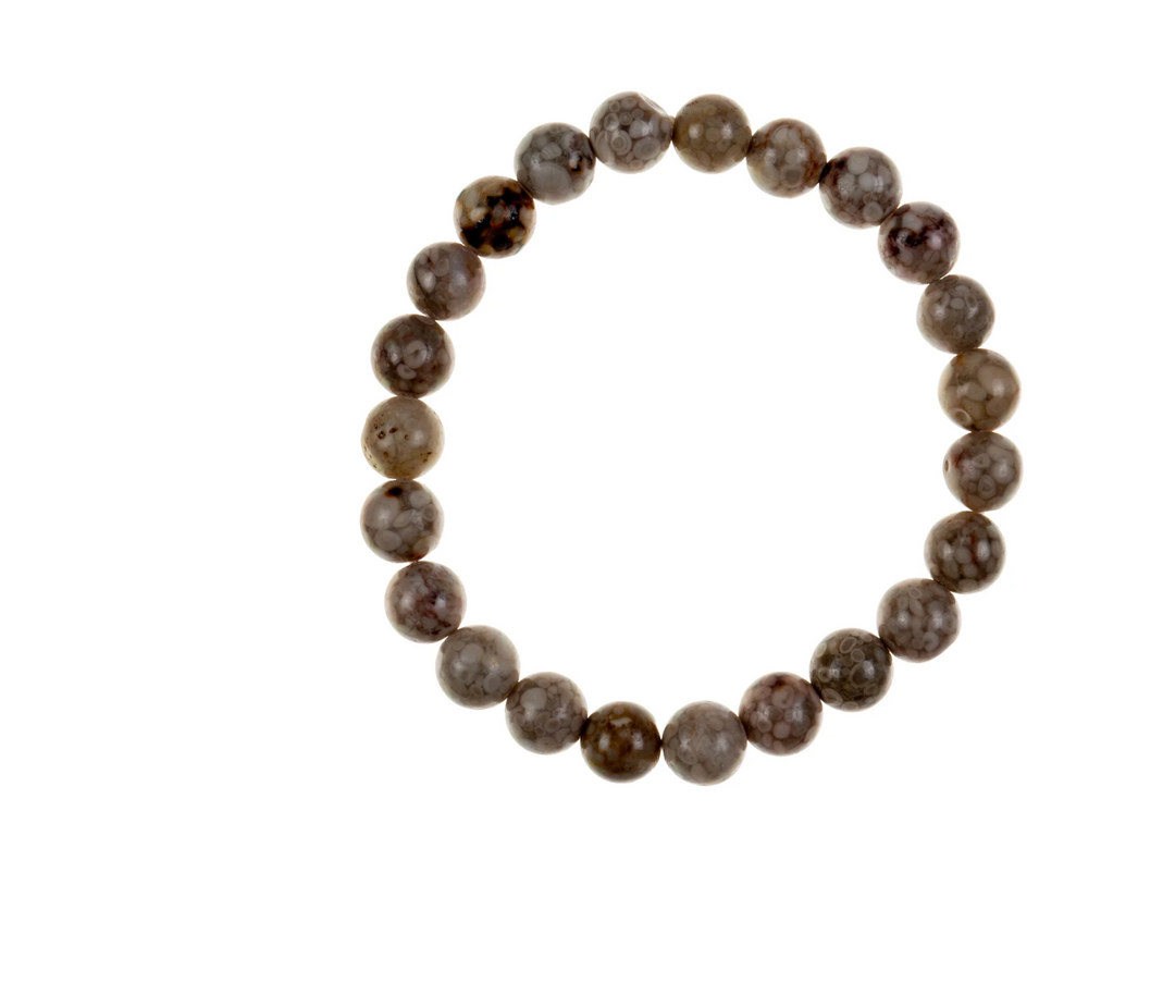 The Rice Wheatstone Beaded Stretch Bracelet with earthy neutral stone beads